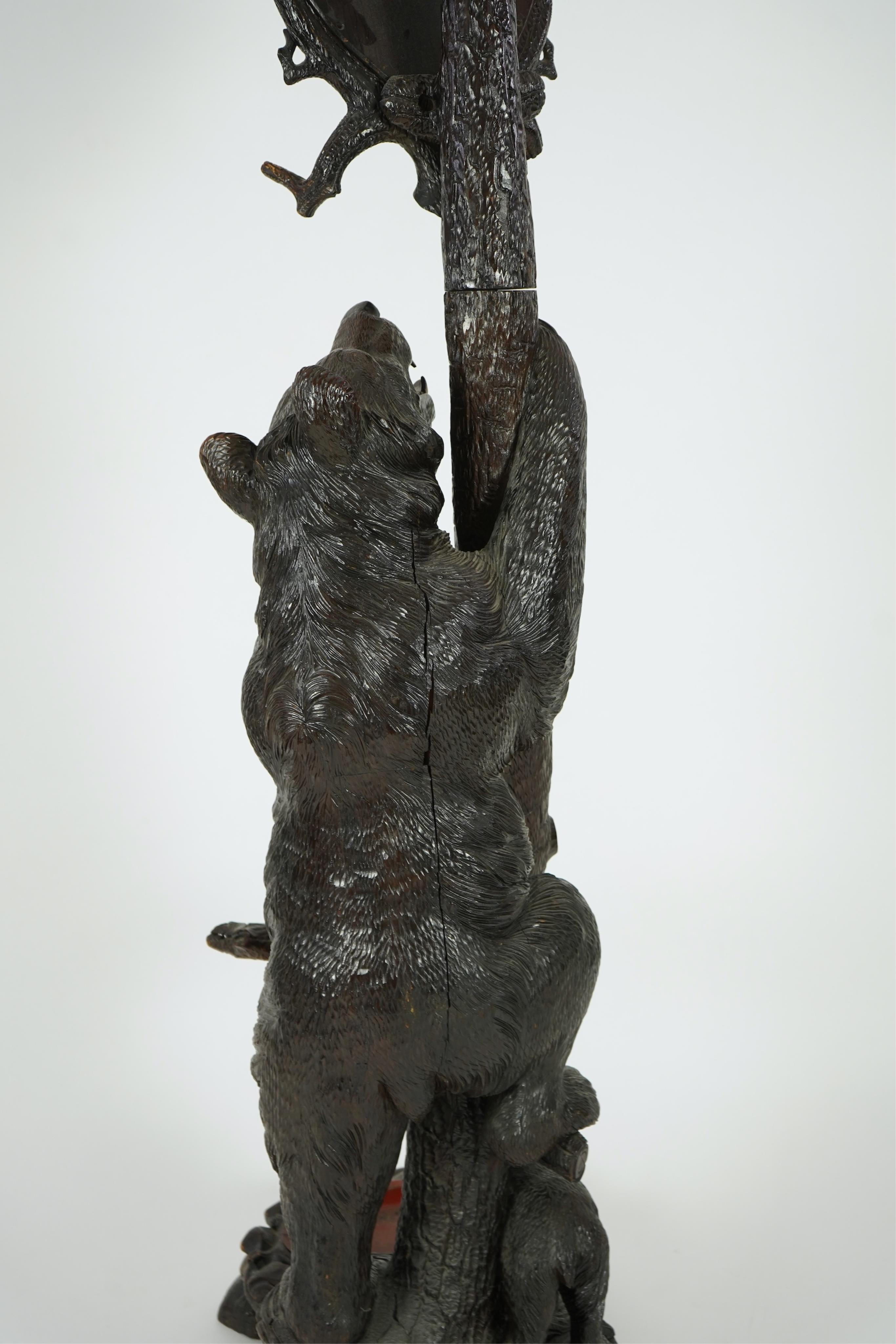 A late 19th century Black forest carved bear hallstand